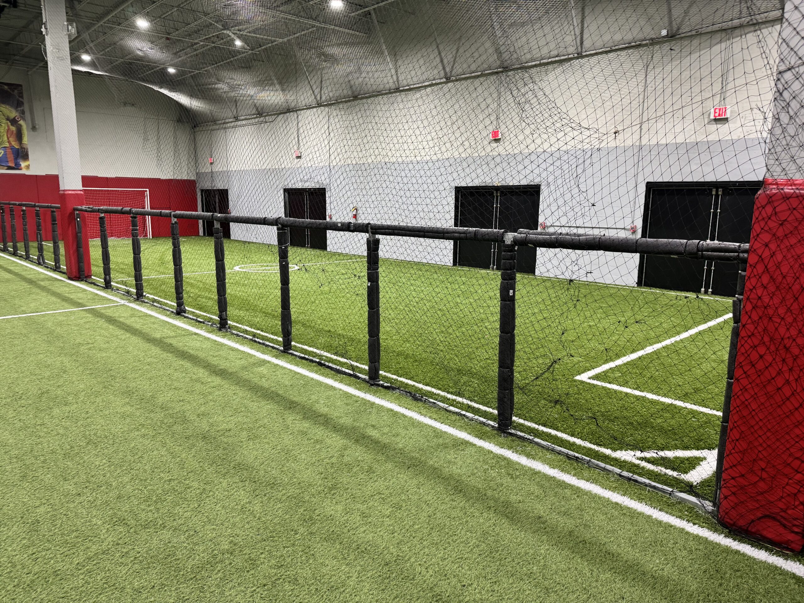 Indoor turf field and goal at Raptors Soccer Academy in Lake Worth, Florida